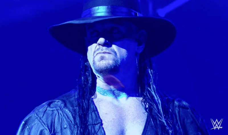 Undertaker, undertaker Biography, undertaker height, undertaker real name, Is The Undertaker really retired from wrestling?, What was The Undertaker's WrestleMania streak and who ended it?, What is The Undertaker's net worth?, Who is The Undertaker married to?, What are some of The Undertaker's most memorable matches?, What is The Undertaker's legacy in professional wrestling?